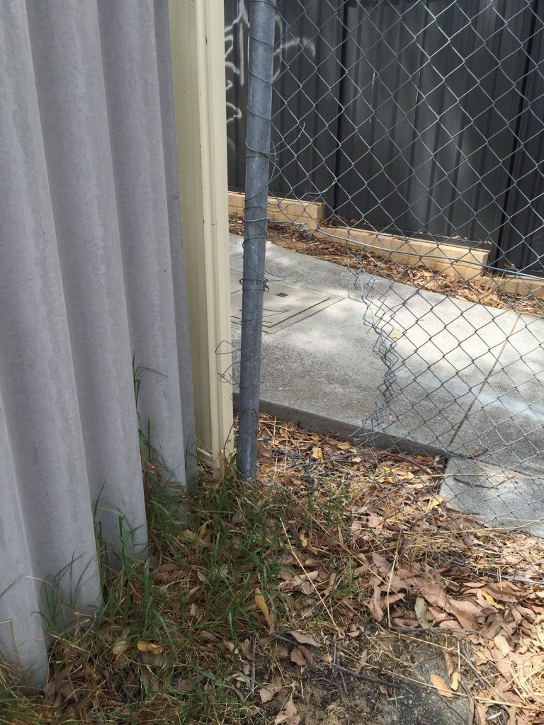 Chainmesh Fence in need of repair