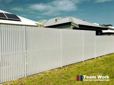 Gray PVC vertical slat fencing installation in Perth WA