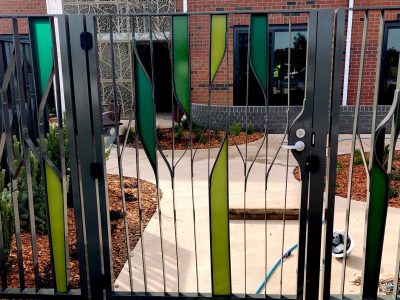 Feature Fence Art Deco Gates Installation by Team Work Fencing Contractors