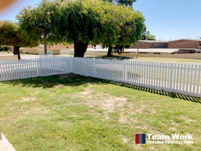 Traditional white PVC picket fencing and gate installation in Rockingham, Perth WA